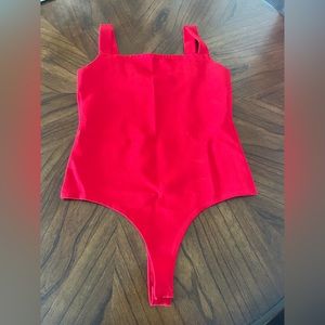 Never-worn stretchy red (thong) bodysuit - size L but fits like M